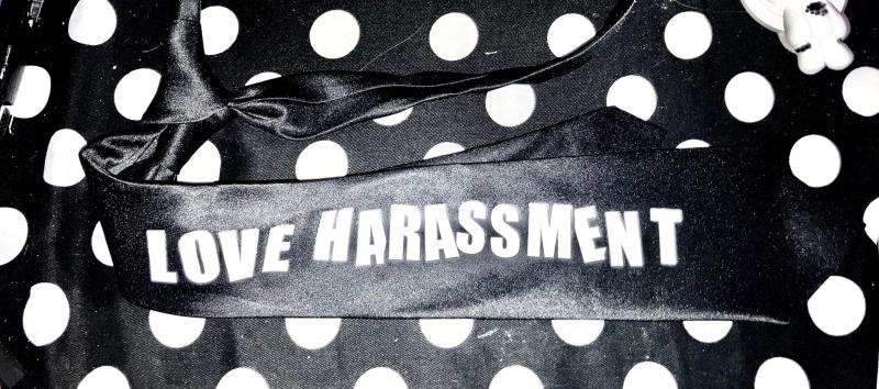 Love Harassment tie